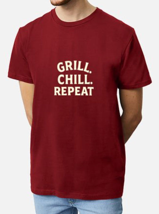 Red t-shirt with 'GRILL. CHILL. REPEAT' text on a white background