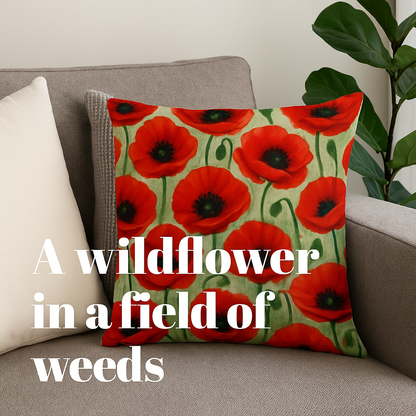 Decorative pillow with red floral pattern on a couch