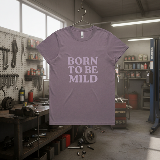 Born to be mild, faded cotton tee. Available in 6 colors, XS - XL. Women’s fit