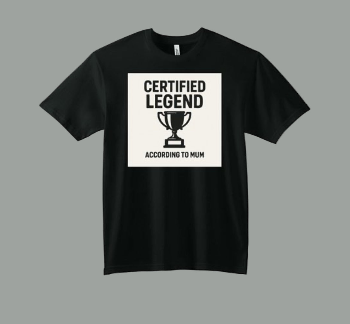 Black t-shirt with 'Certified Legend According to Mum' text and trophy graphic on a white background