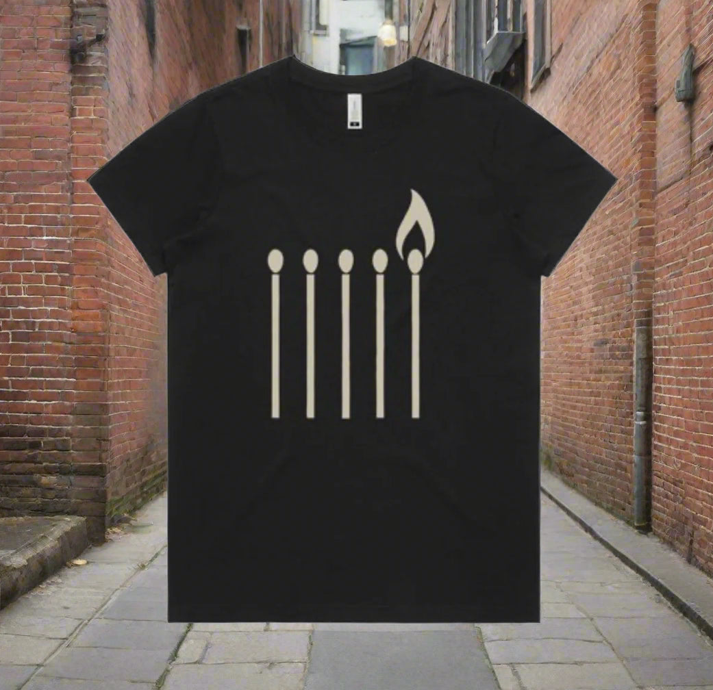 One Match Still Burns Tee – Minimalist Resistance Edition(women’s fit)organic cotton