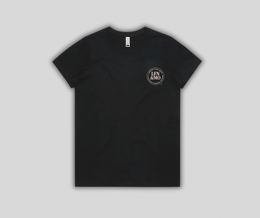 Black t-shirt with a logo on the chest against a light gray background